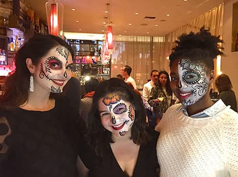 Three women in costumes
